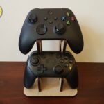 Laser Cut Compact Holder for Two Controllers Free Vector